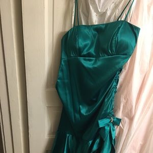 green silk formal dress with ruffled bottom
